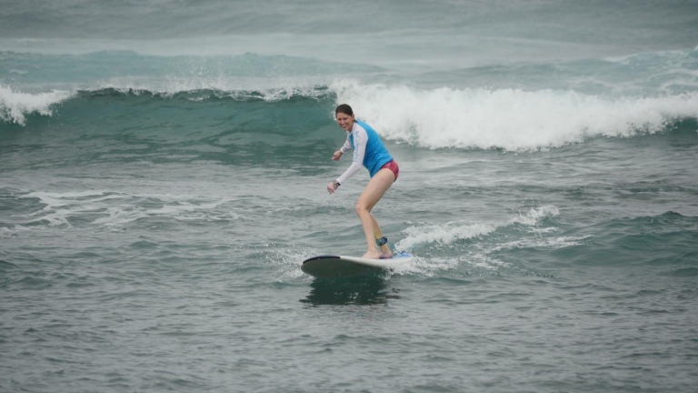 Surfing in Hawaii. Being outside and being active helps me to thrive